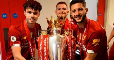 Adam Lallana with Premier League Trophy